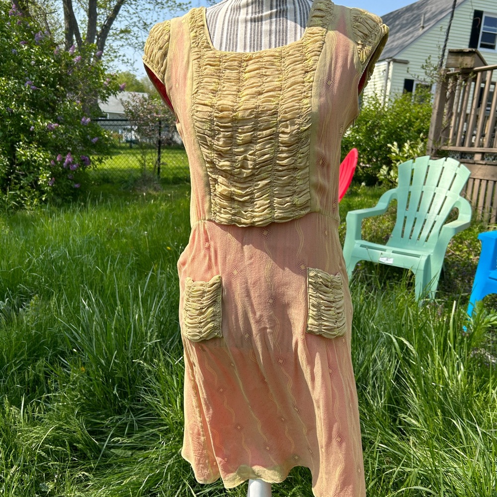 James Coviello fusha and crème dress.